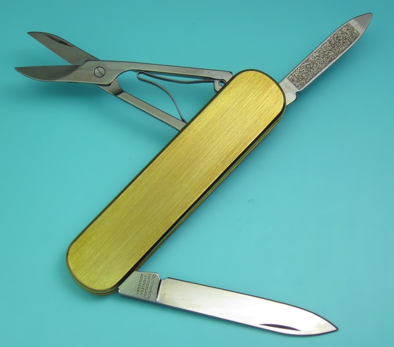 A 74mm gold plated Victorinox Ambassador with satin finish and no key-ring (0.6500.80).